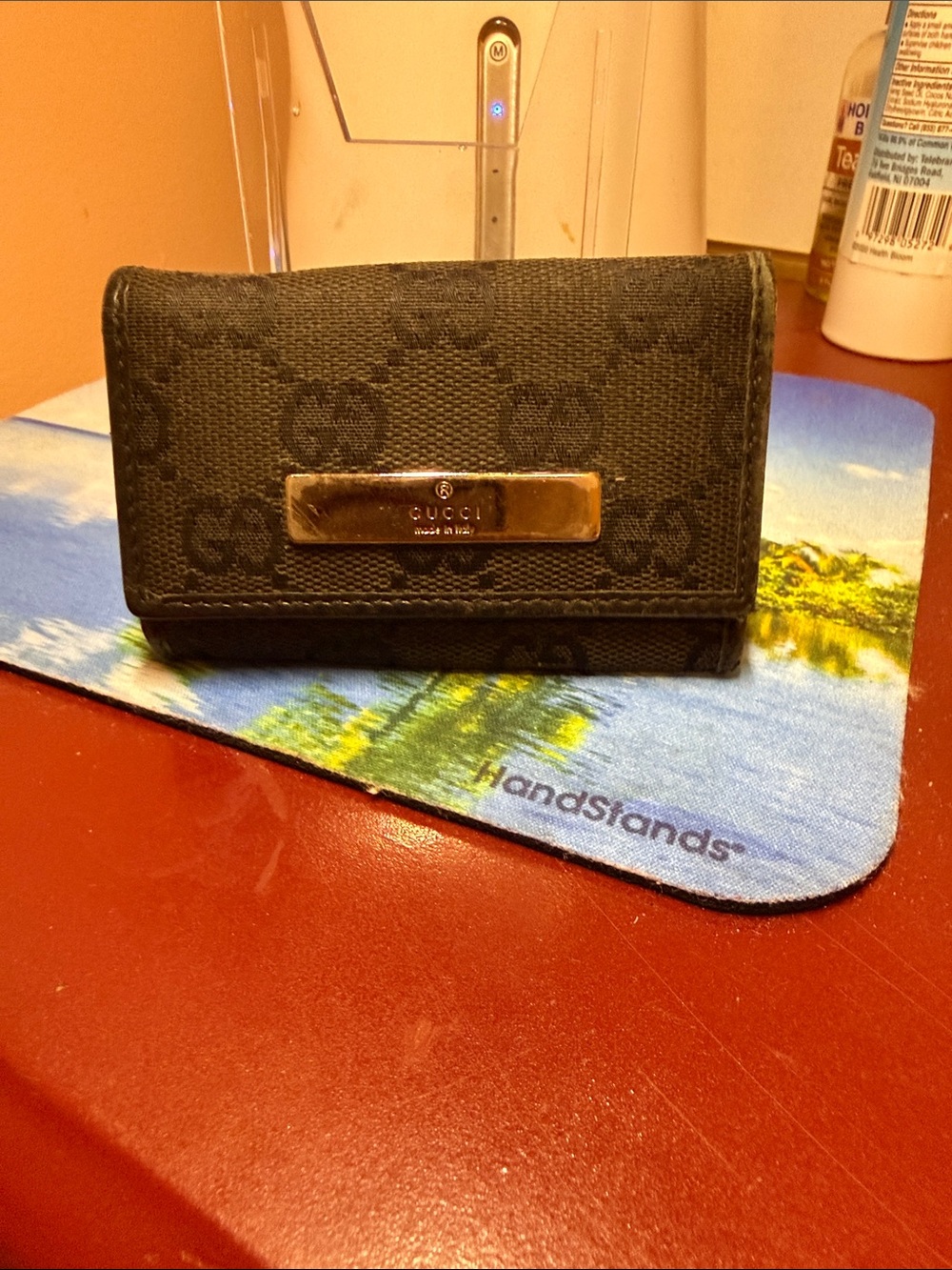 Gucci Black Monogram Canvas key/card Holder with Metal Logo Plaque.